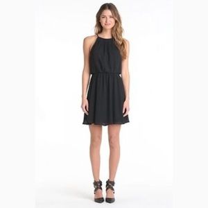 Lush black skater dress with back cutout
